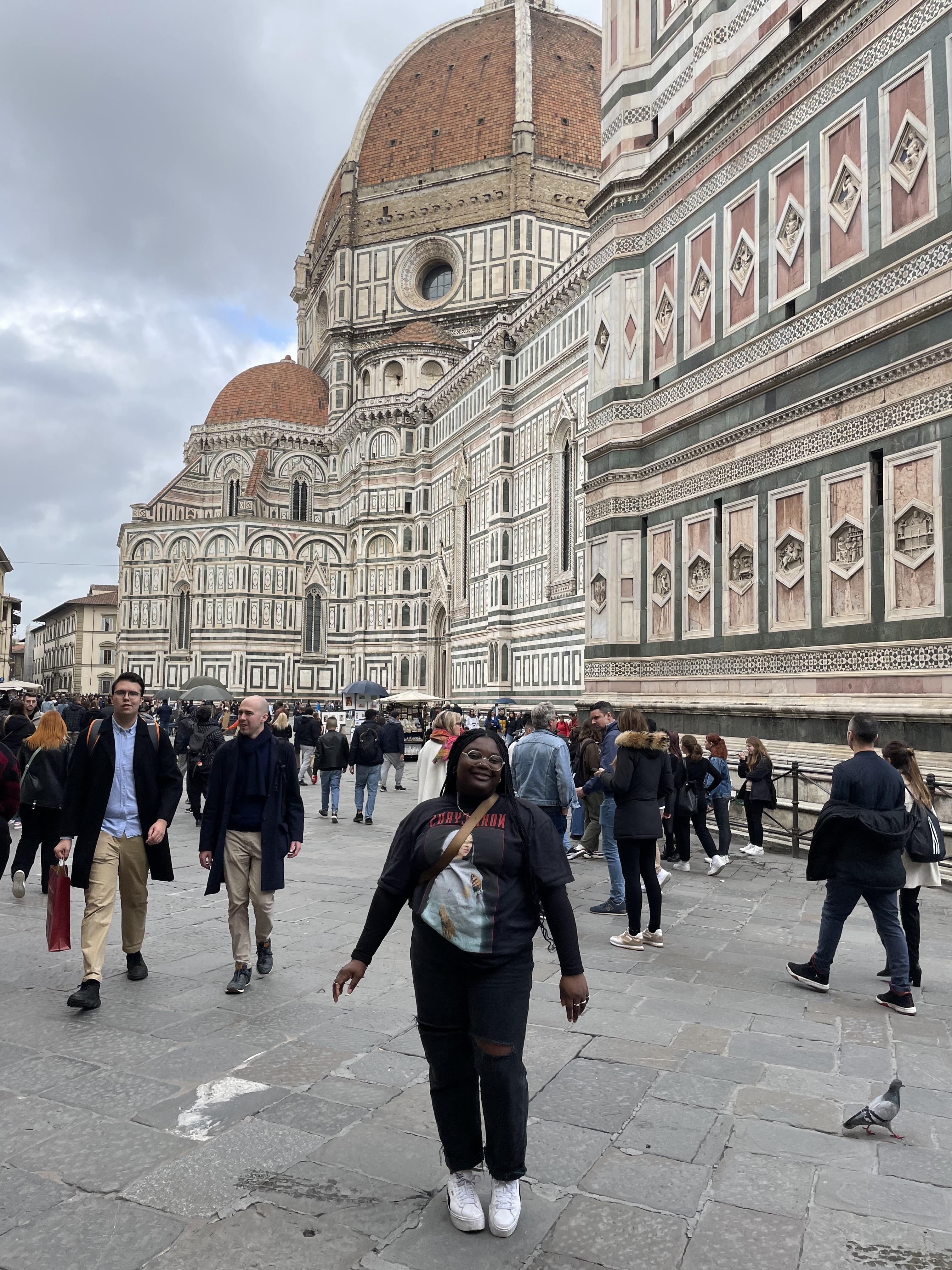 Student posing in front of Duomo in Florence